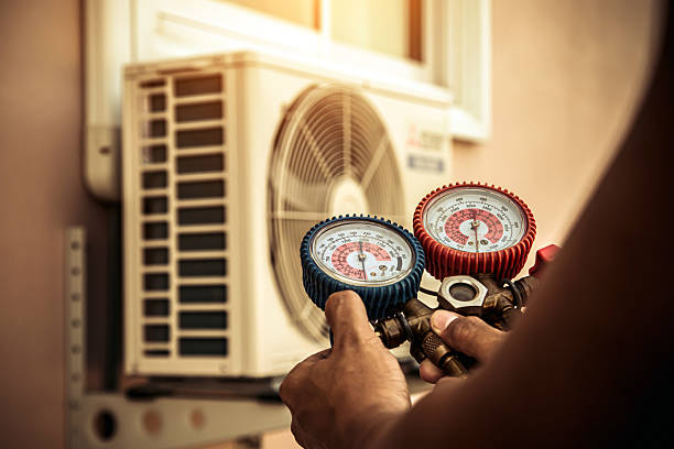 Professional Hvac technician working in Riverside, CA